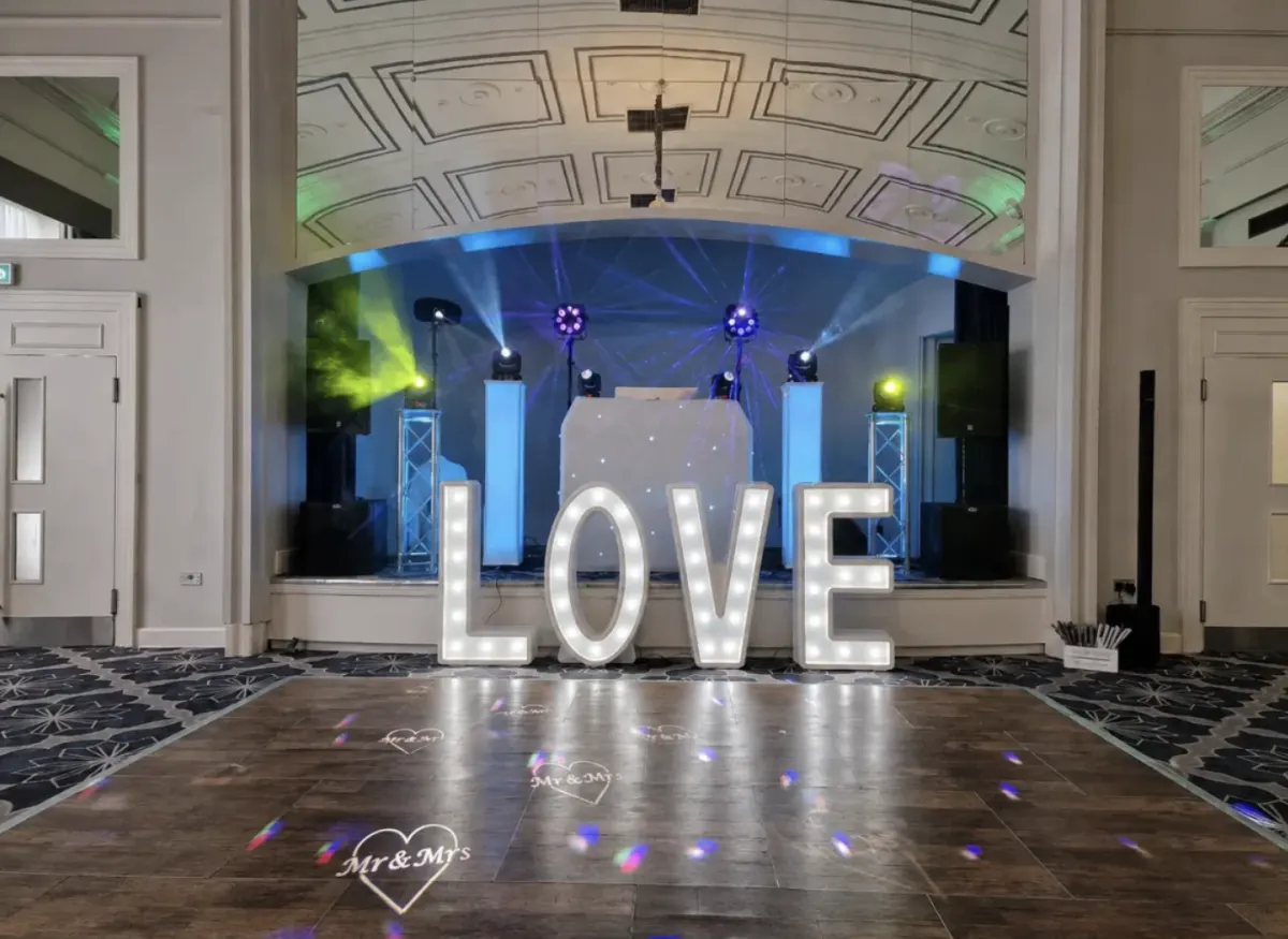 Elegant wedding DJ setup at a reception