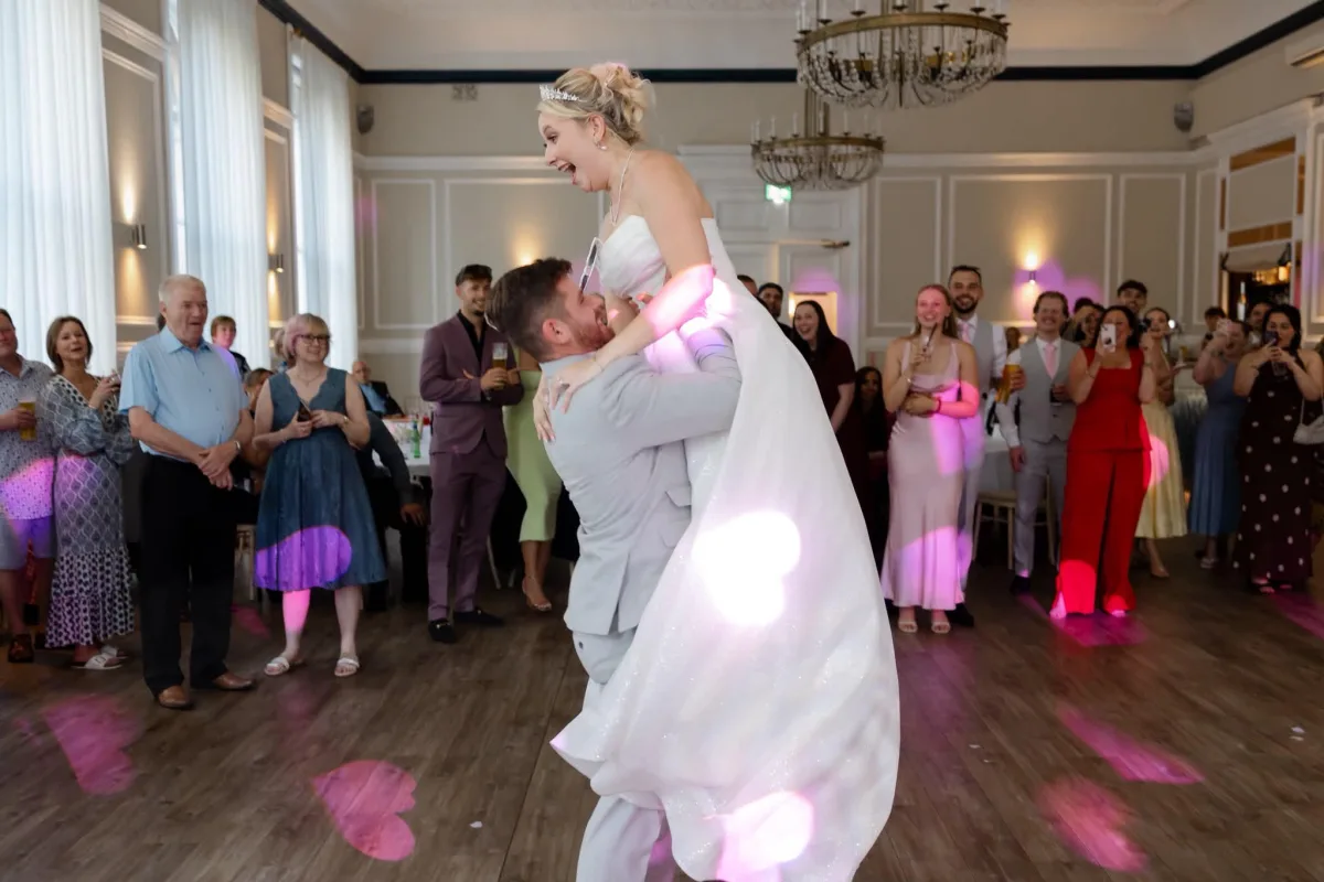 Wedding DJ setup with illuminated LOVE letters ready for the evening
